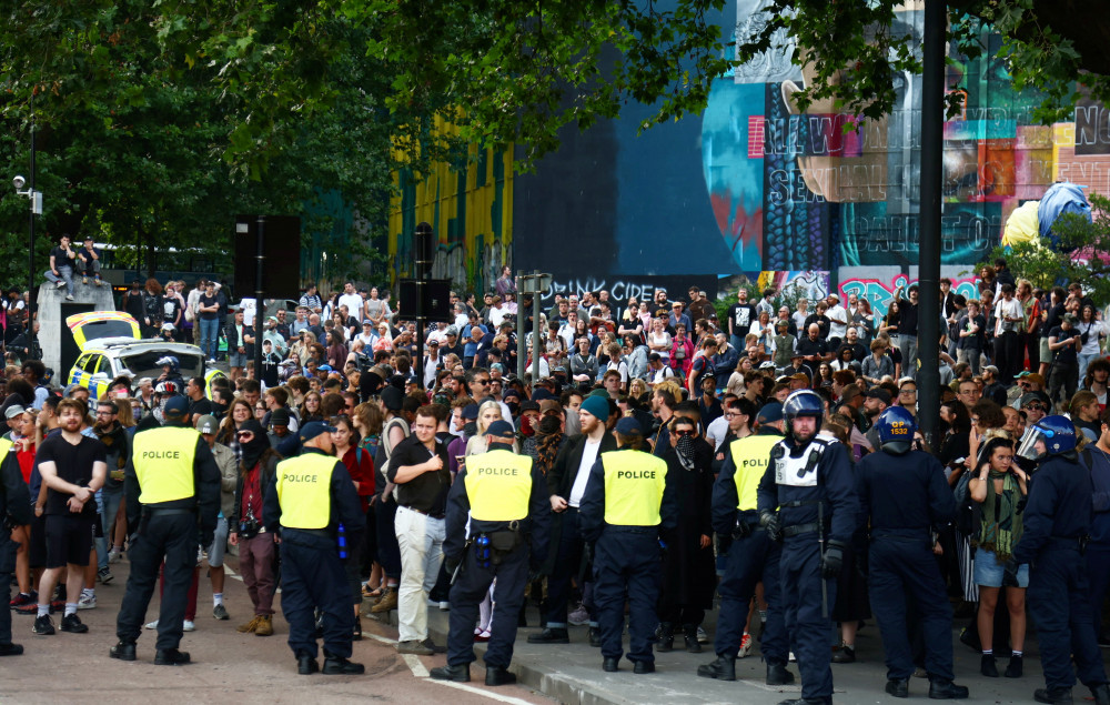 Police in Bristol on Sunday, 4 August as protest turn violent (credit: SWNS).