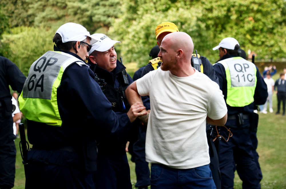 Police in Bristol on Sunday, 4 August as protest turn violent (credit: SWNS).