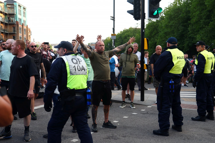 Police in Bristol on Sunday, 4 August as protest turn violent (credit: SWNS).