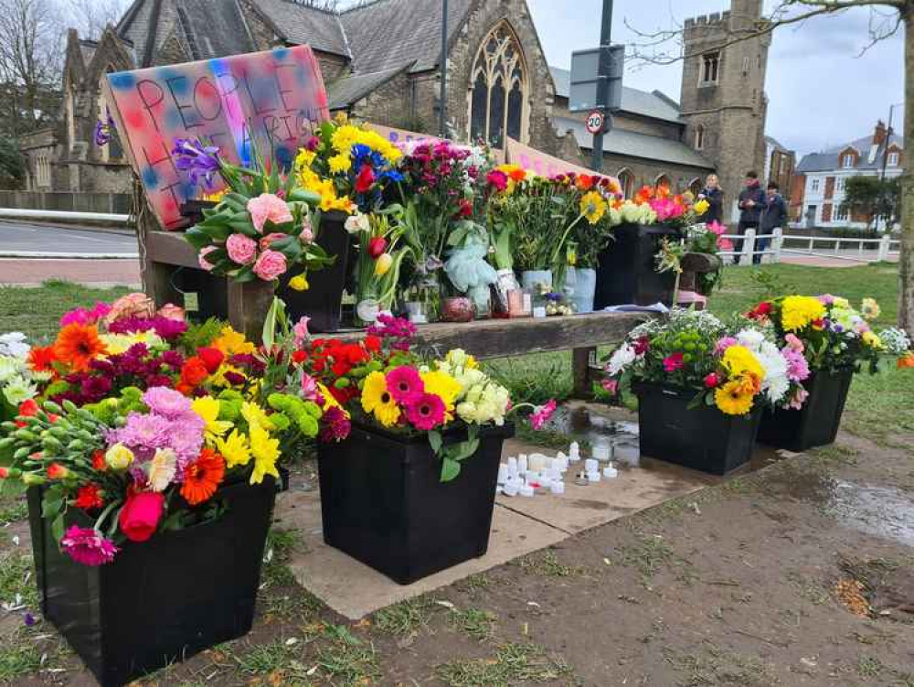 A bench in Twickenham Green with flowers dedicated to Amelie Delagrange (credit: Nub News). 