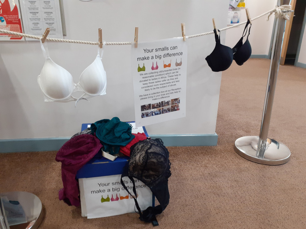 Practice Manager, Janet Weaver, has set up a washing line in the waiting room at Greenmoss Medical Centre, Scholar Green for 'Smalls for All'. (Photo: Janet Weaver)