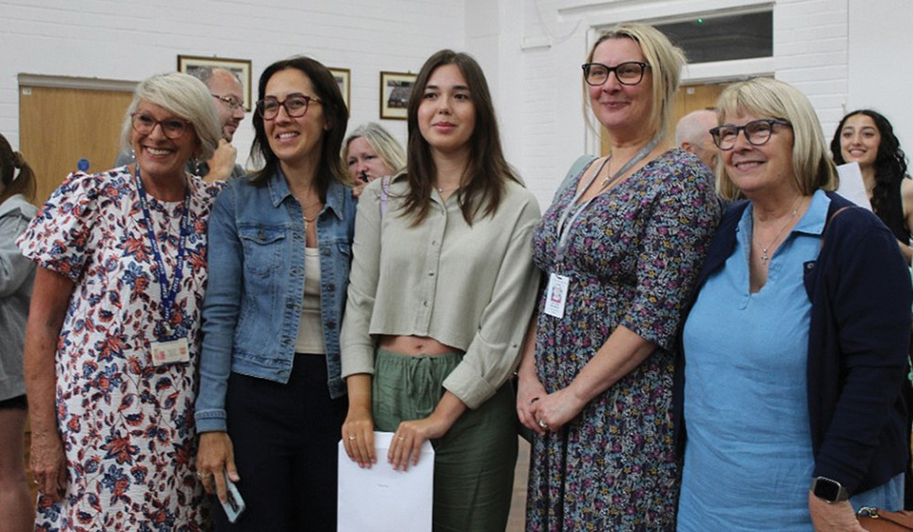 Top student Rianna and her proud mum flanked by Head Penny Johnson, Cllr Vikki Hartstean and Michele Lucas from Thurrock Council