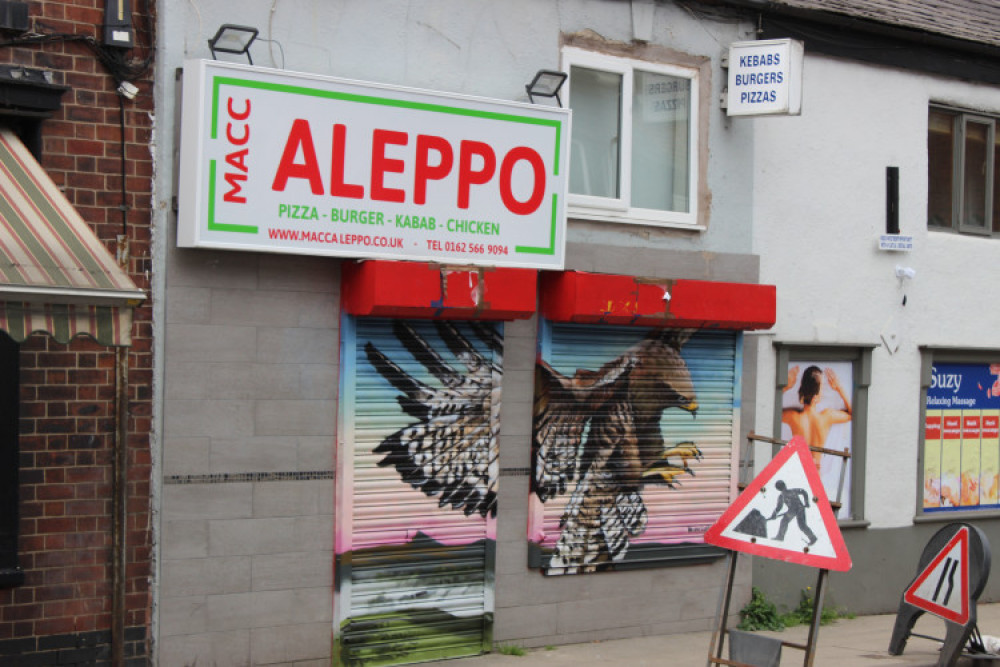 The unit pictured last year. The mural and takeaway signage isn't there today. (Image - Macclesfield Nub News) 