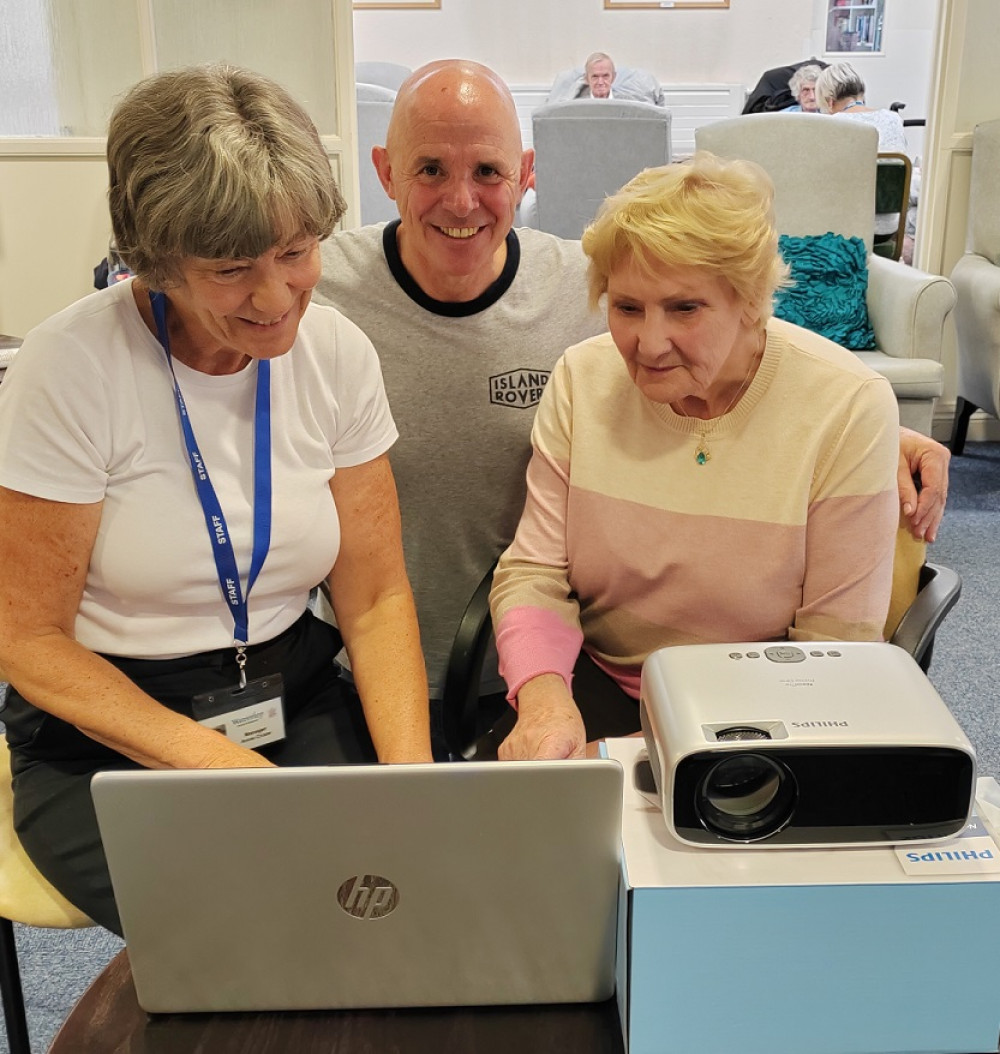 Cllr Rik Spencer with new IT equipment (image via Waverley)