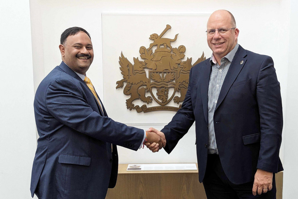 Movers and shakers - Leader of Hounslow Council, Cllr Shantanu Rajawat (left) greets TfL Transport Commissioner Andy Lord (right) at Hounslow House (credit: Hounslow Council).