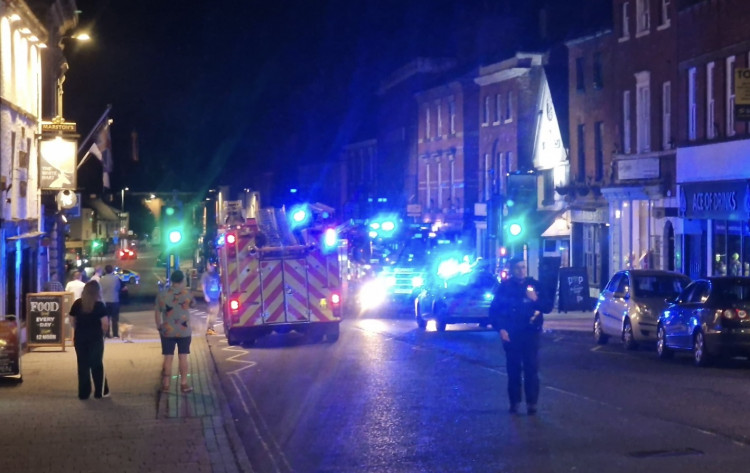 Fire crews outside the Bull's Head as the incident caused Market Street to be closed. Photo: Carl Benfield