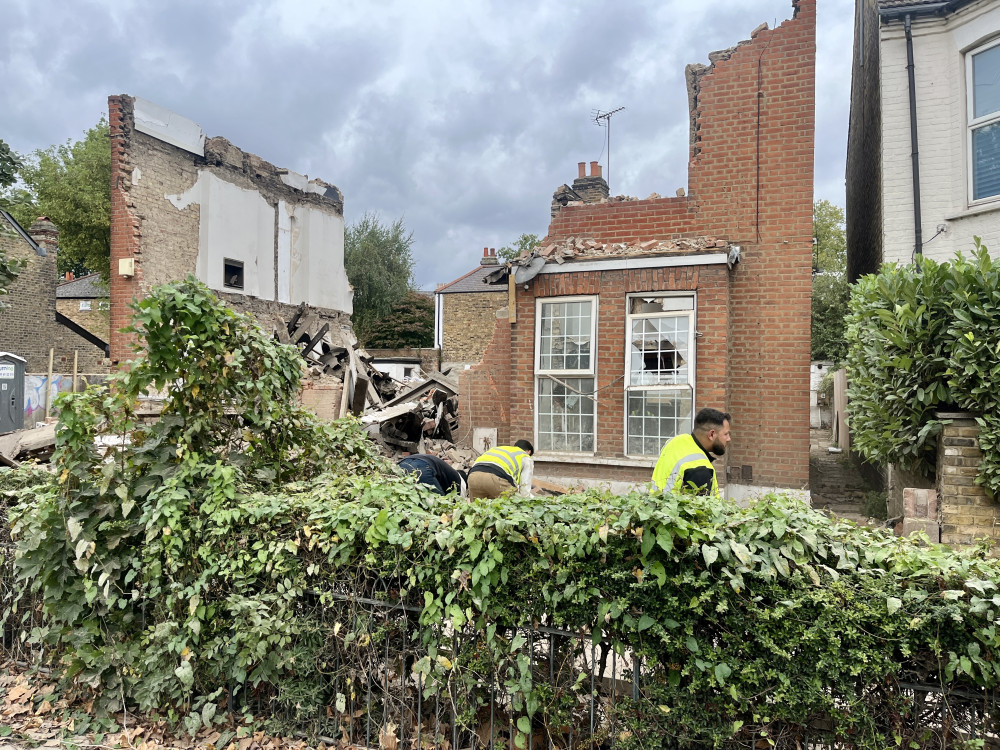 Two homes in Lower Mortlake Road, Richmond collapsed on 10 September (credit: Cesar Medina). 