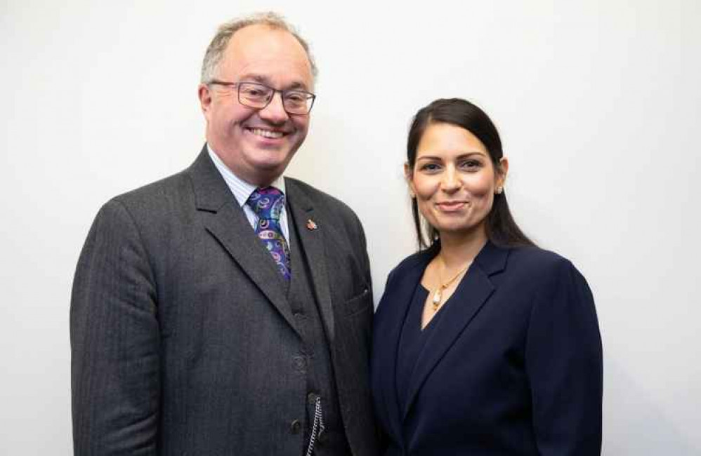 Rupert Matthews with Home Secretary Priti Patel