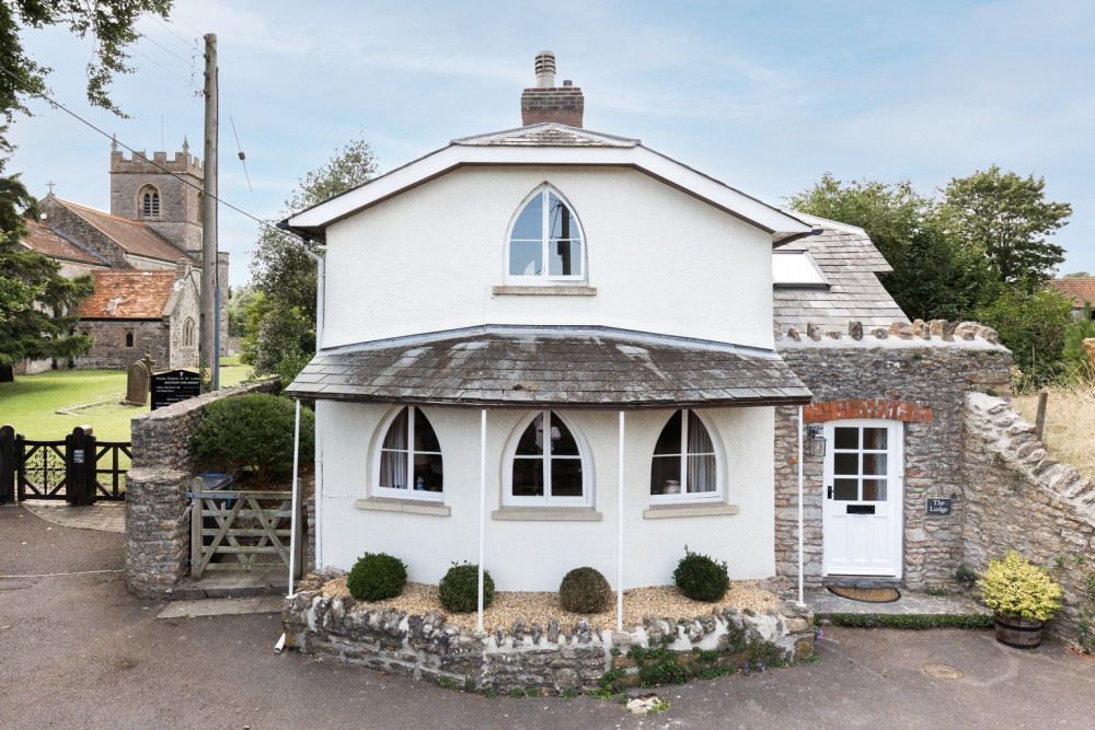 The Lodge’s period features, stunning garden, and cosy interiors make this Westbury Sub Mendip cottage a picture-perfect retreat.