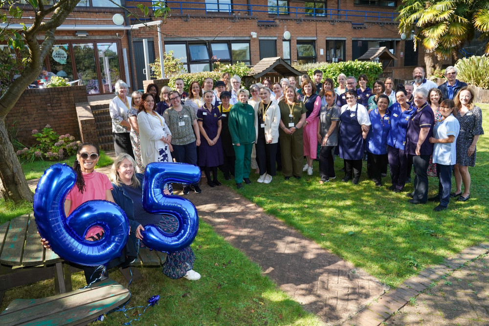 Marie Curie ambassador and actress Suzanne Packer and Rachel Jones, Marie Curie Cymru Associate Director with staff from the Marie Curie Hospice, Cardiff and the Vale, marking 65 years of care.  Photo by Patrick Olner