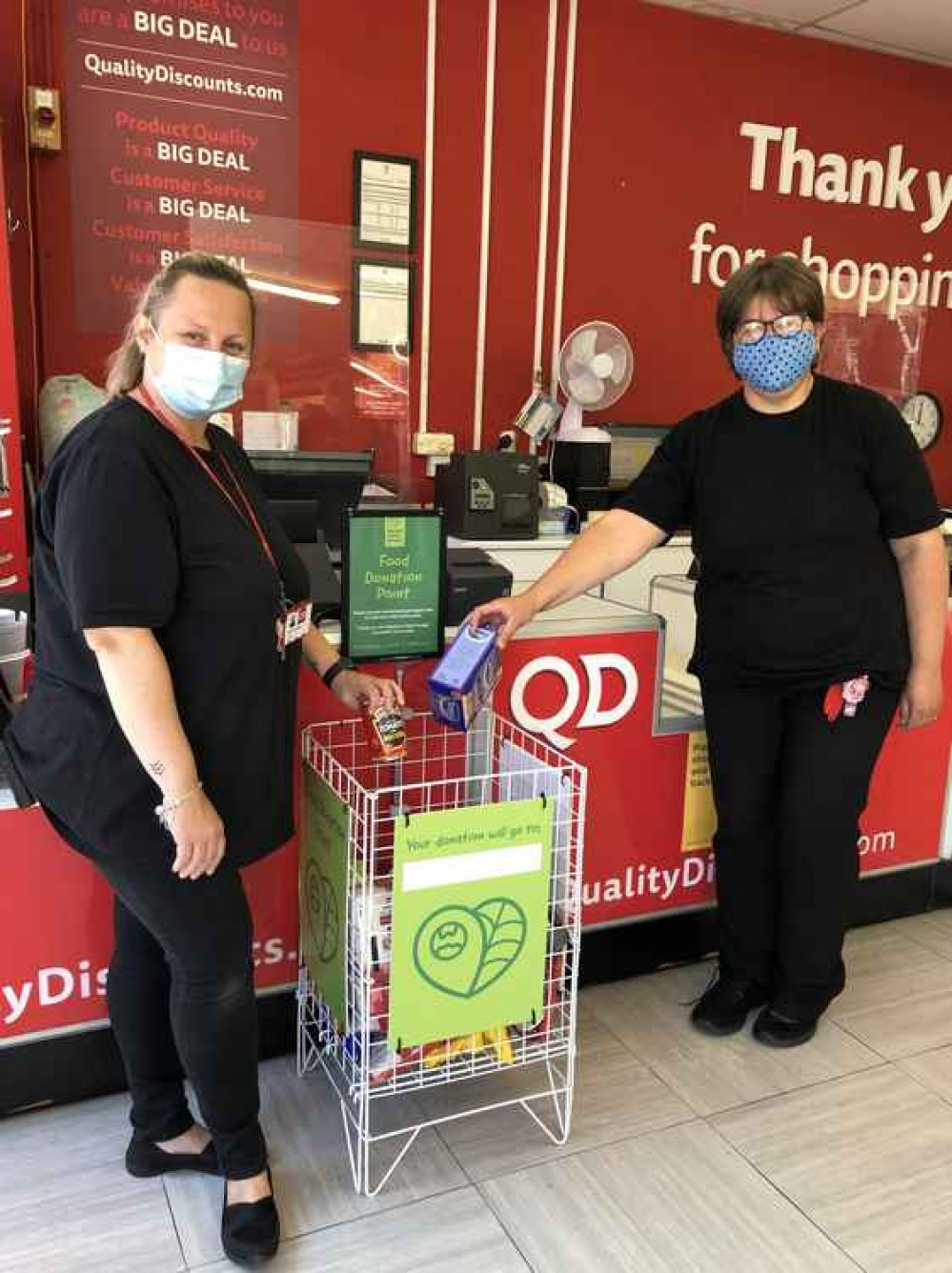 Photo caption: Discount retailer QD is now collecting for local food banks across 24 of its stores. Left – right, Team members Mary-Ellen Buxton and Katie Burgess.