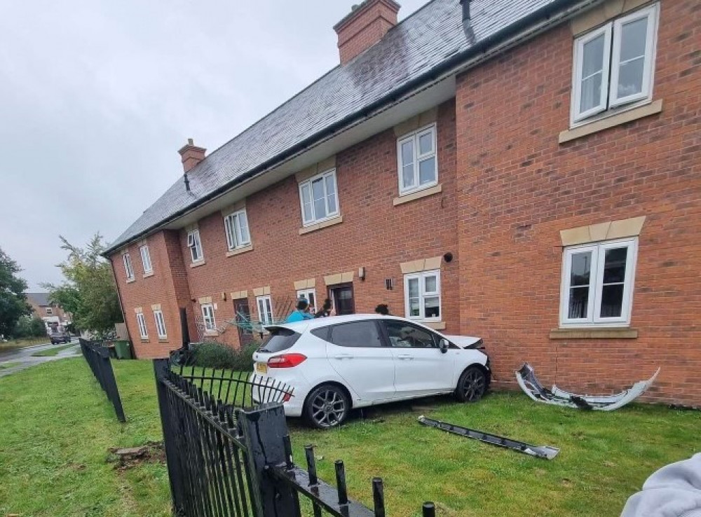 The car hit the flats on Campriano Drive on Sunday (image supplied)