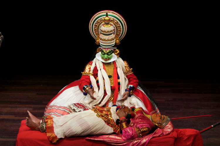 A traditional Kathakali dance, known for its vibrant costumes and expressive storytelling.