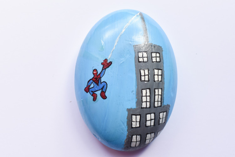 Tom Holland who was born in Kingston has painted a pebble for the Momentum Children's Charity's charity auction (Credit: Momentum Children's Charity)