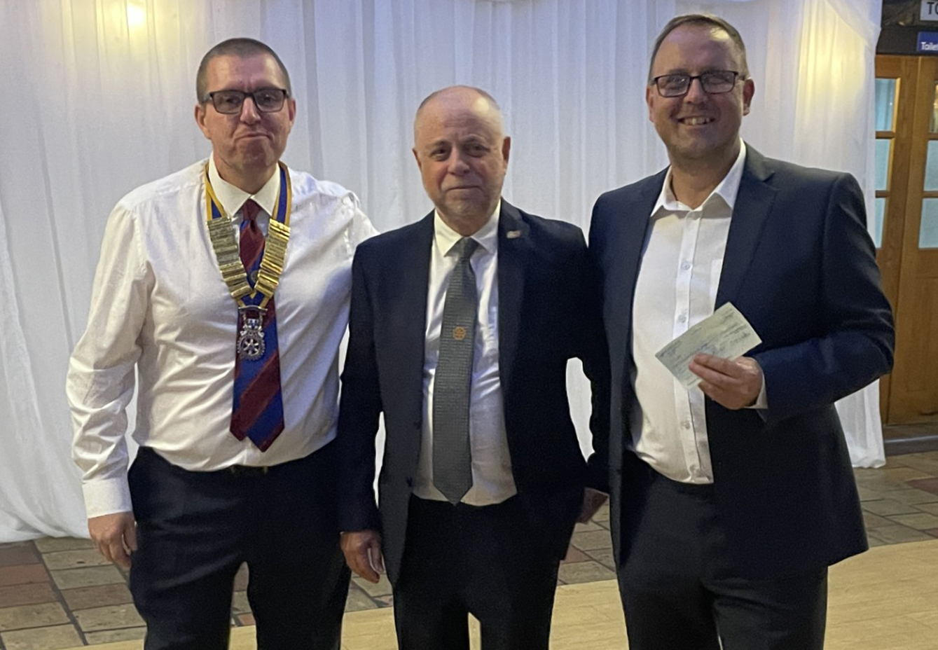 Gary Tapsell collecting on behalf of CHAPS, with President Paul Luke and Rotarian Paul Havis.