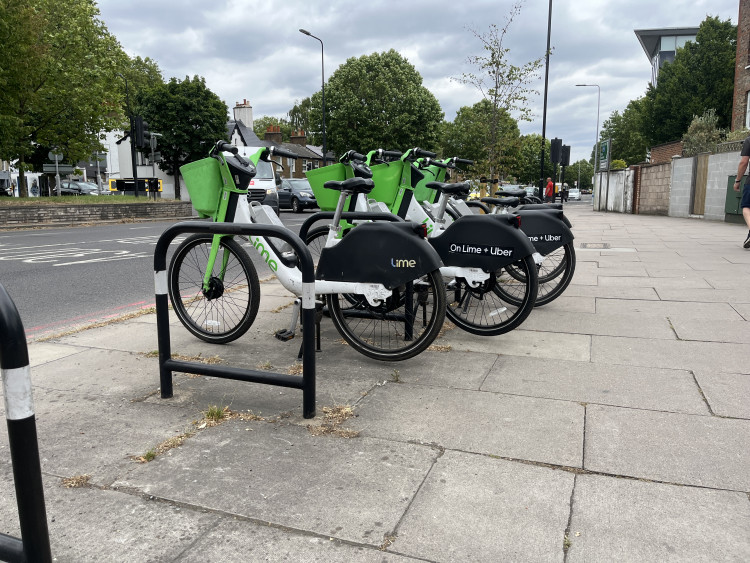 The amended motion commits the council to holding operators accountable for obstructive e-bike parking around the borough (credit: Cesar Medina).