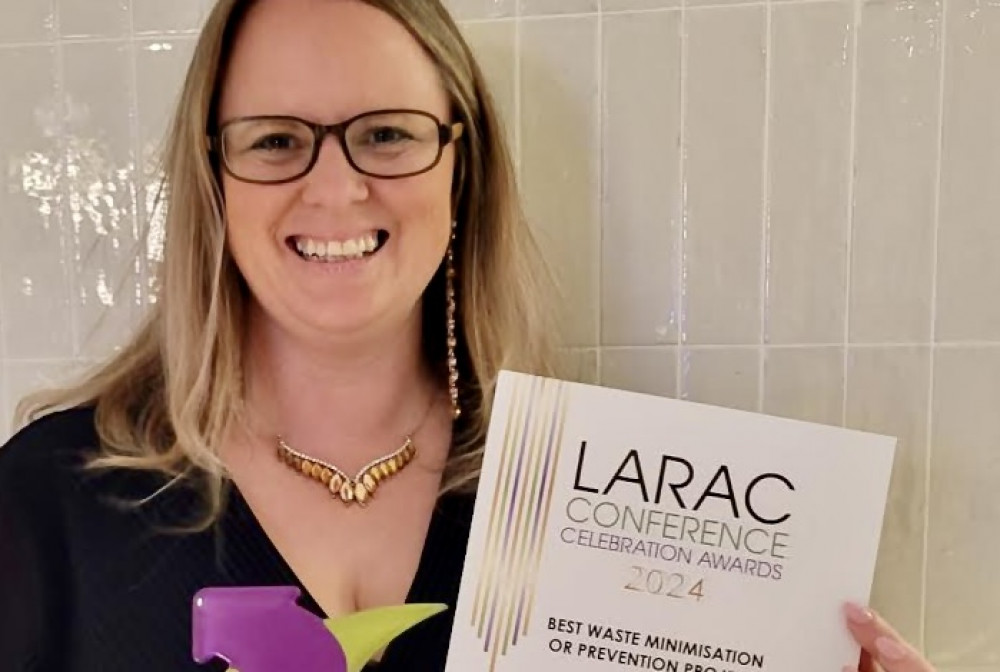 Helen Crouch, Food Poverty Officer at NWLDC with the LARAC trophy and certificate. Photos: North West Leicestershire District Council