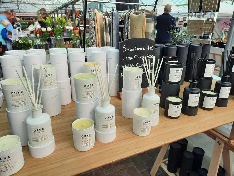 Orka of Leicester selling candles, oils, and bath salts at the craft fair