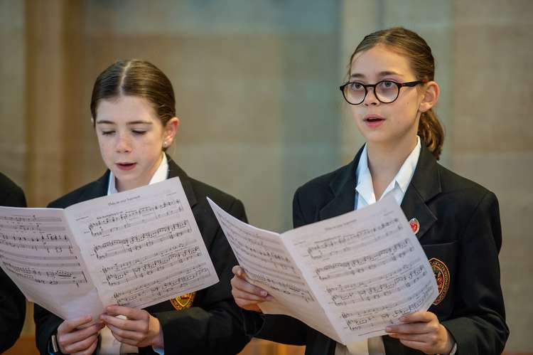 The choir singing 'This is our harvest' at the harvest ceremony