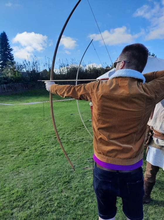 One of the bigger kids trying his hand at archery