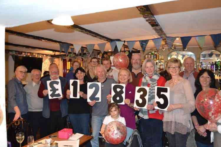 The Blossom Appeal thanking Anna and Kevin, and some of their customers at the Wheatsheaf, Tattingstone.