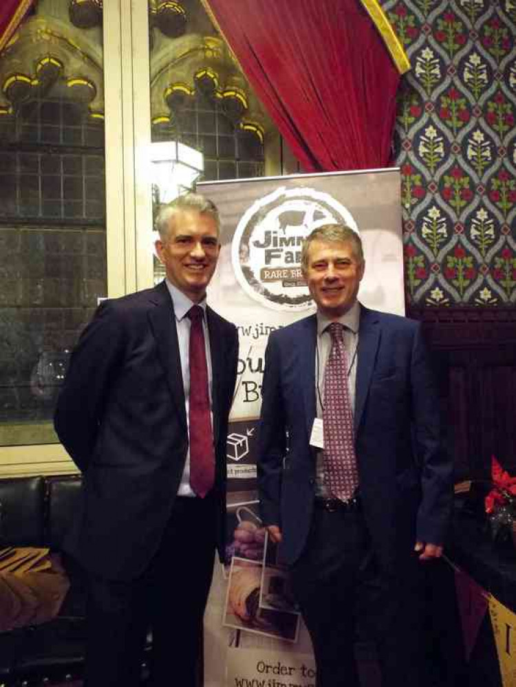 James Cartlidge with one of the petitioners at the Houses Of Parliament