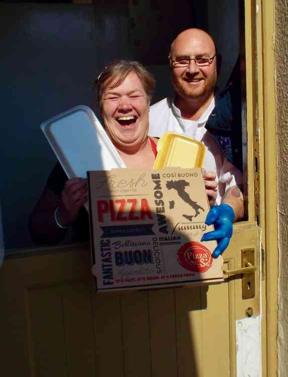 Sarah Pallant and Jamie Barwick at the Rose offering free slices of pizza to  NHS workers