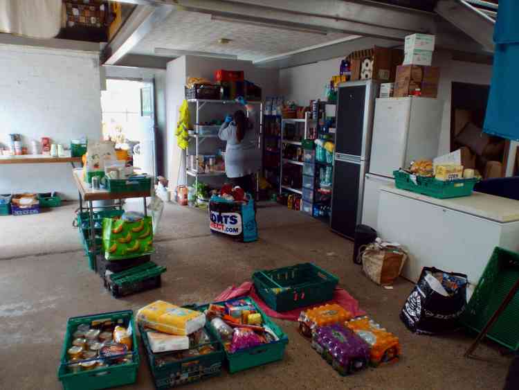 Volunteers put together food parcels