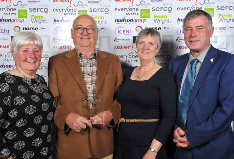 Cllr Derek Davis with a community group which is what the locally awards are aimed for