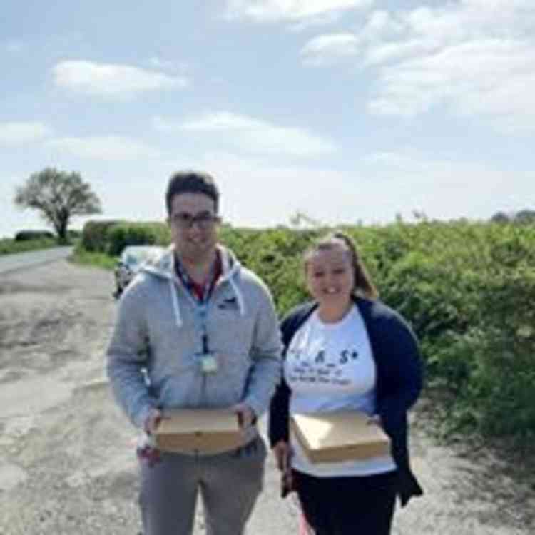 Key workers collected pizzas at Freston lay-by - Picture: Dolly's Pizza