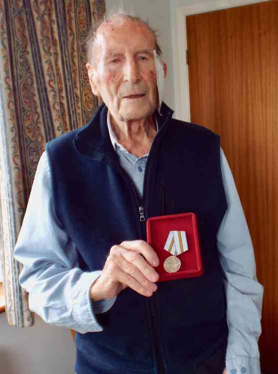 Tom with his Victory in the Great Patriotic War 75th year commemorative medal