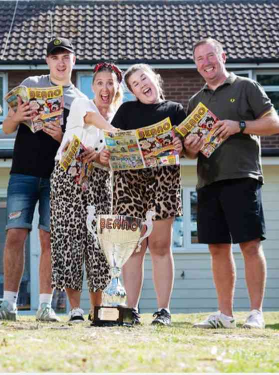 Britain's funniest family with their Beano trophy