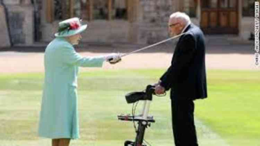 HM Queen Elizabeth, who has reigned for 25,000 days knights Sir Tom Moore