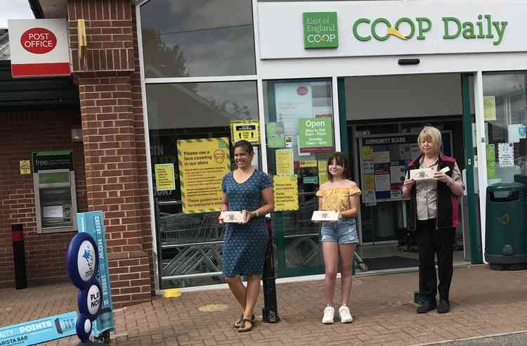 Anna Sterling with Olivia Cresswell and staff member outside Holbrook Co-op.