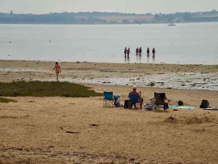 Bathers enjoying Harkstead beach