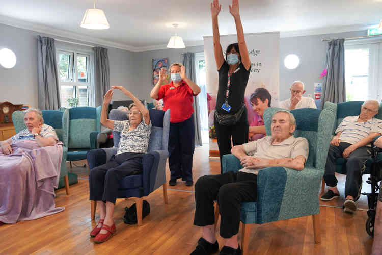 Spring Lodge residents and staff taking part in Zoom exercise class