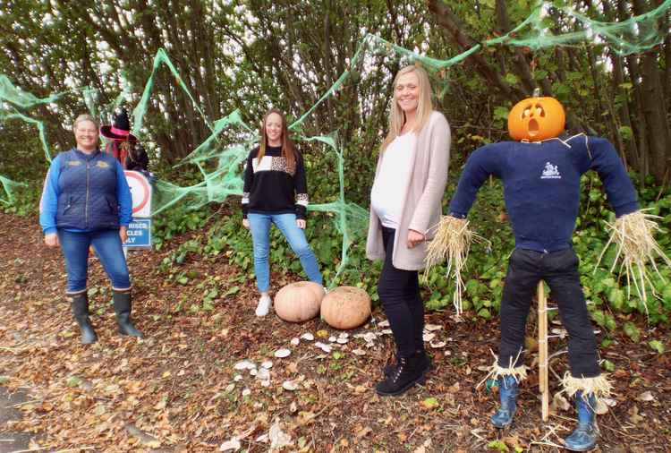 FOSS members Hazel Ackland, Theresa Muhlbauer, and chair Kirsty Button on the spooky trail