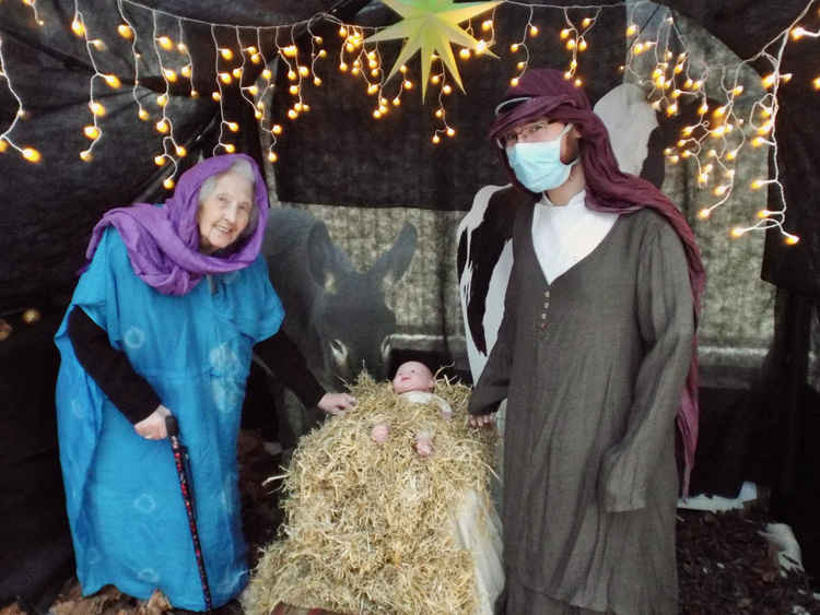 Jean and Tom are Mary and Jospeh at Spring Lodge's nativity scene