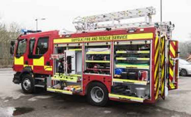 Suffolk fire crews rescue trapped driver