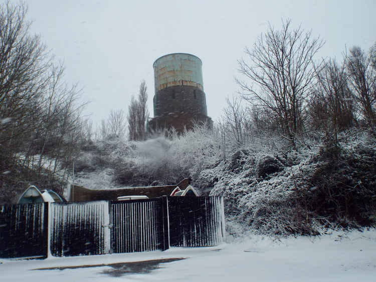 Ganges water tower from snowy marina, where old athletics track was