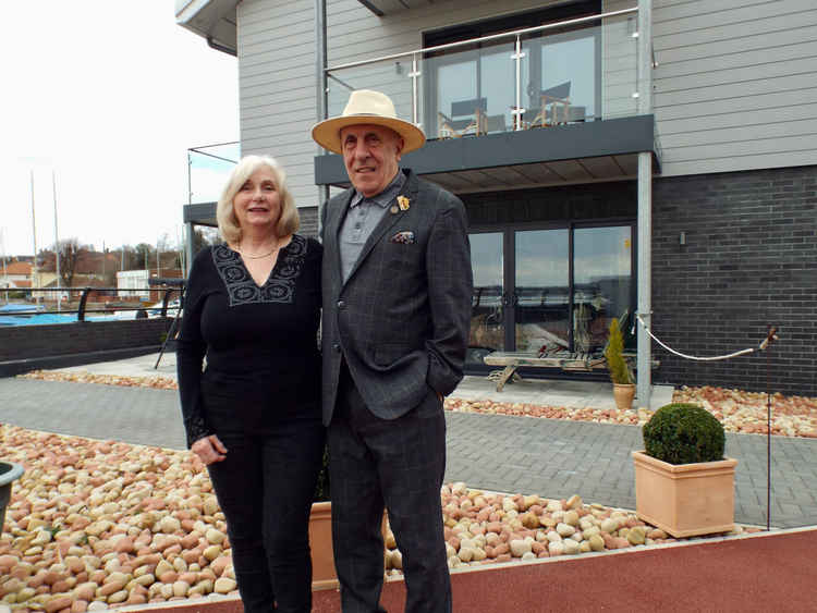 Malcolm and Rita outside the studio and apartment with views