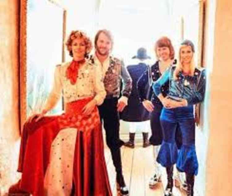 Eurovision Song Contest winners Abba wearing Malcolm Hall creations on their Waterloo album cover