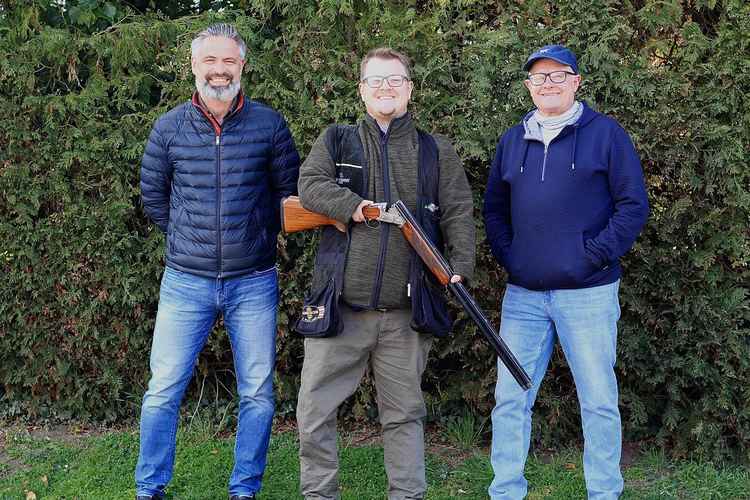 British Open shooting champ Sam Nunn flanked by sponsors Nigel Spinks and Joe Garnham