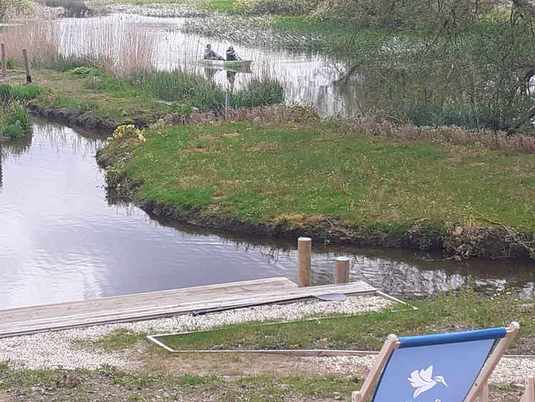 Kayakers gently meander along the river at Constable Park