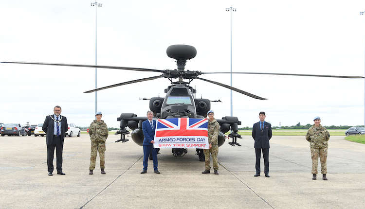 An Apache helicopter at Wattisham that flew in Afghanistan with RHS students and peninsula councillor Derek Davis