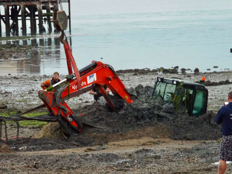 Digger got stuck in mud, at an estimated cost of more than £70k