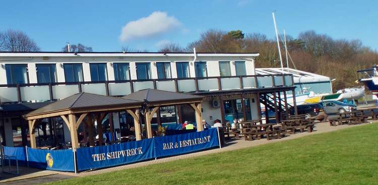 Victory House, with Shipwreck Lofts, bar, restaurant, workshops, and museum at Shotley marina