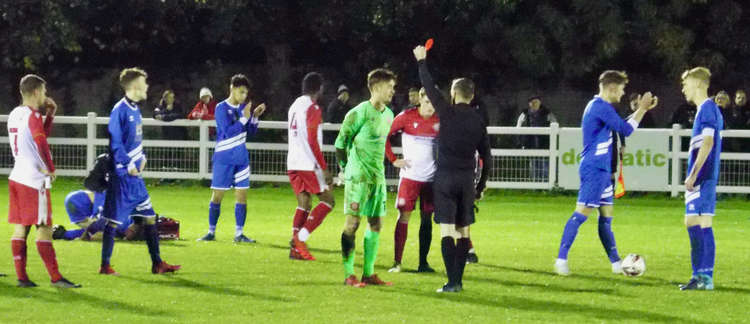 Stevenage keeper Alex Aitken sees red