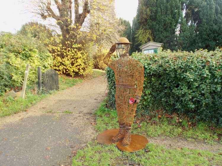 Last year's Tommy standing guard by St. Mary's Church, Holbrook