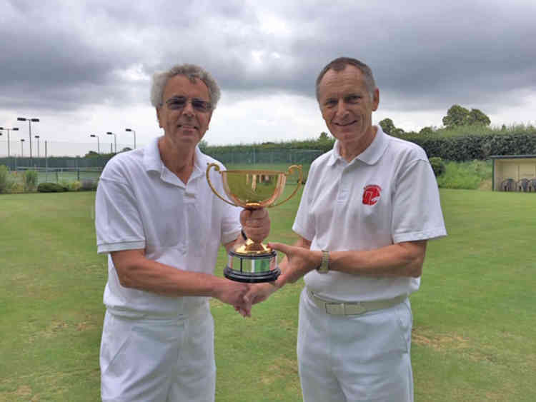 Adrian Morris, right, presenting last year's trophy to Mervyn Harvey.